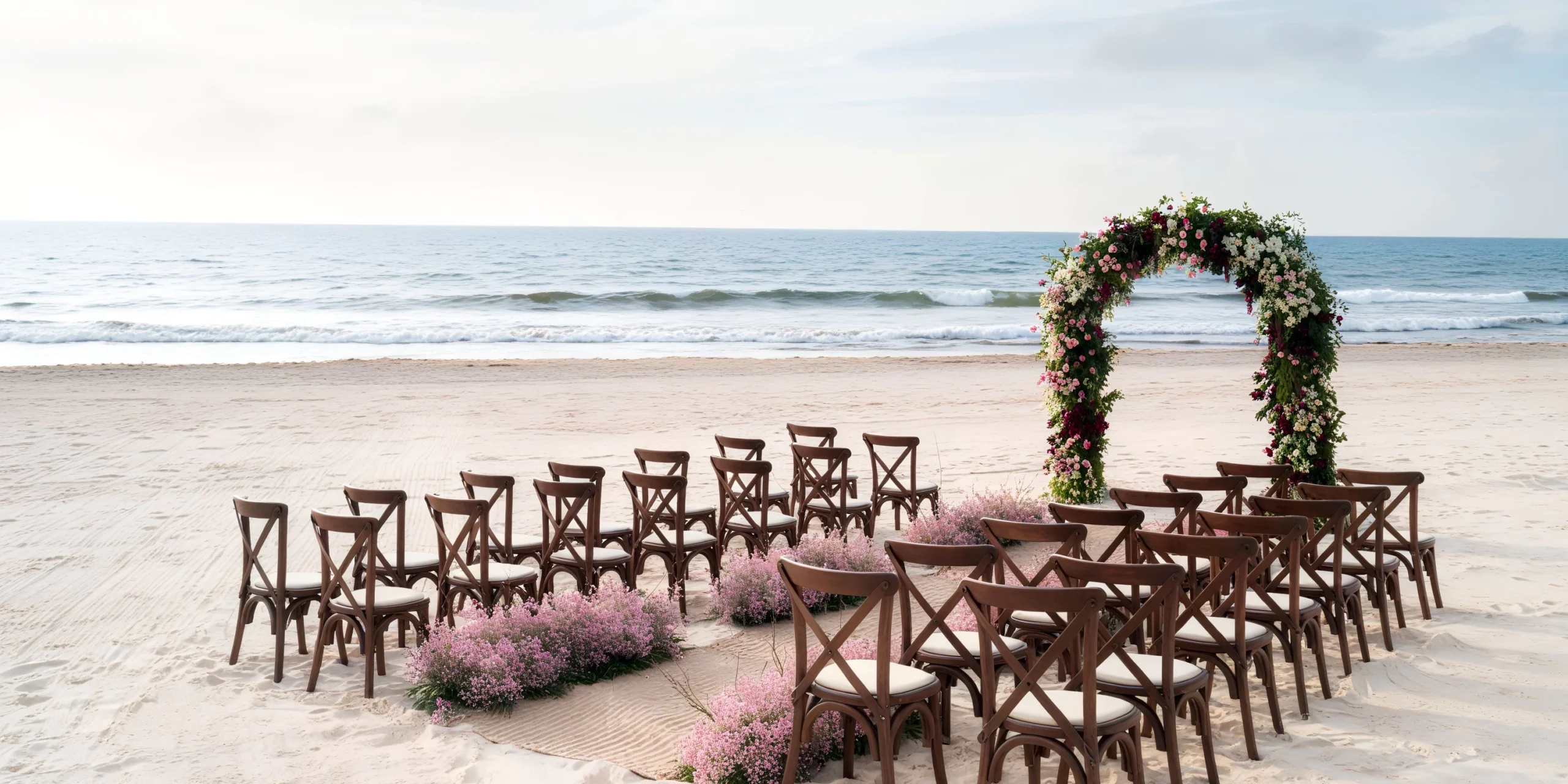 Beach wedding ceremony setup on the white sand beach at Hyatt Zilara Cancun
