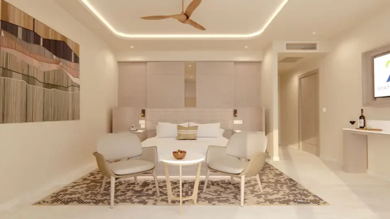 Grand Presidential Suite master bedroom with king bed and private balcony at Hyatt Zilara Cancun.