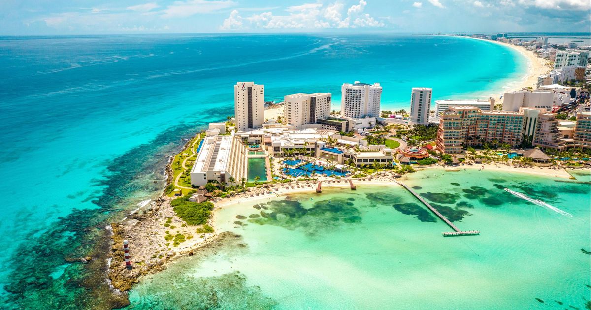 Hyatt Ziva Cancun all-inclusive beachfront resort with large pools and panoramic ocean views.