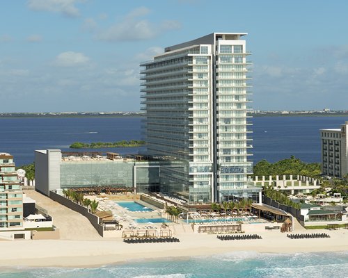 Secrets The Vine Cancun adults-only all-inclusive resort with sleek tower design and infinity pools in Cancun.