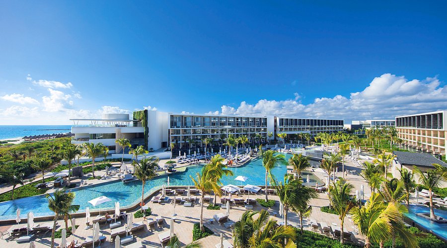 TRS Coral Hotel adults-only luxury all-inclusive resort with modern pools and beachfront suites near Cancun.