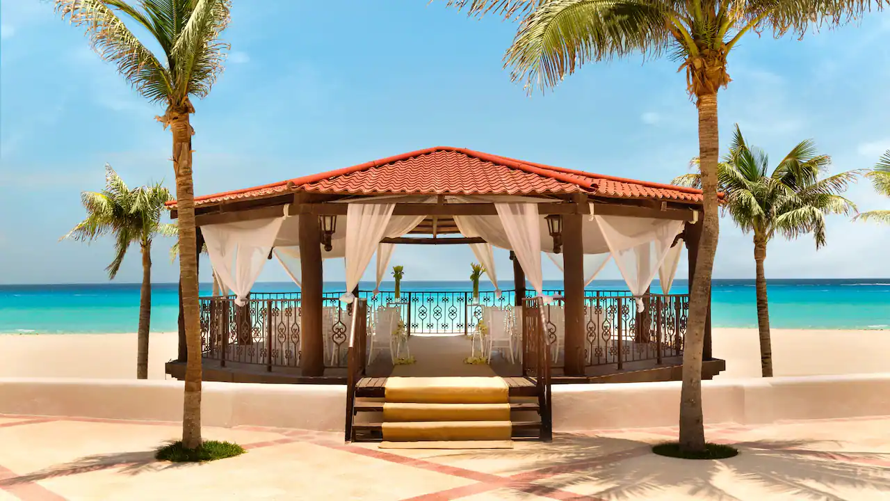 Oceanfront wedding gazebo overlooking the Caribbean Sea at Hyatt Zilara Cancun, ideal for beachfront destination weddings.
