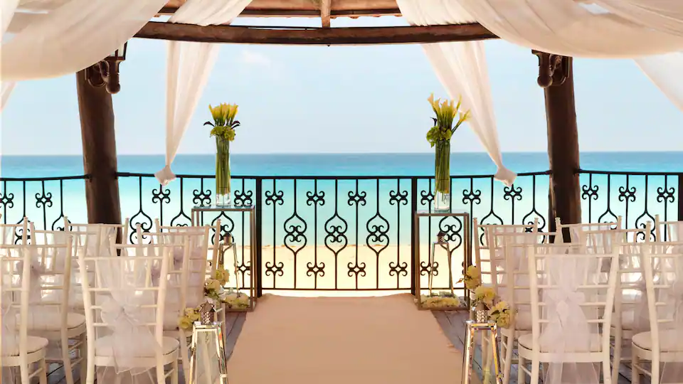 Wedding gazebo ceremony setup overlooking the beach at Hyatt Zilara Cancun